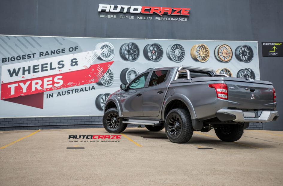 MITSUBISHI TRITON VAPOR BLACK MACHINED WITH DARK TINT